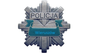 widzimy odznakę policyjna i napis Policja KPP Wieruszów.