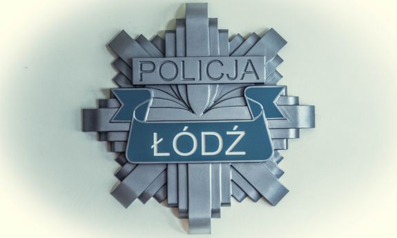 widzimy odznakę policyjną i napis Policja Łódź.